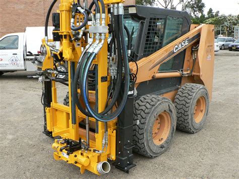 skid steer drill rig attachment|skid steer well drilling attachment.